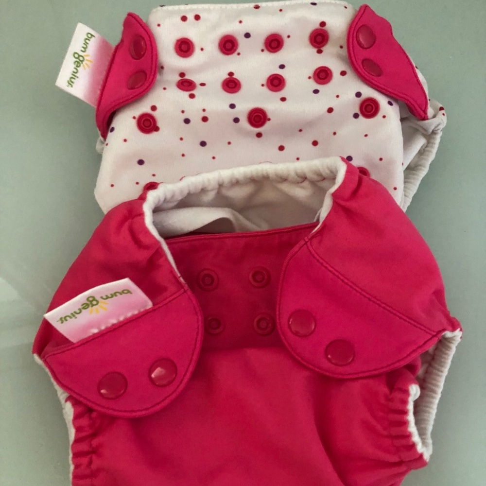 Set of 2 bum genius cloth diapers in excellent condition.  Inserts not included.